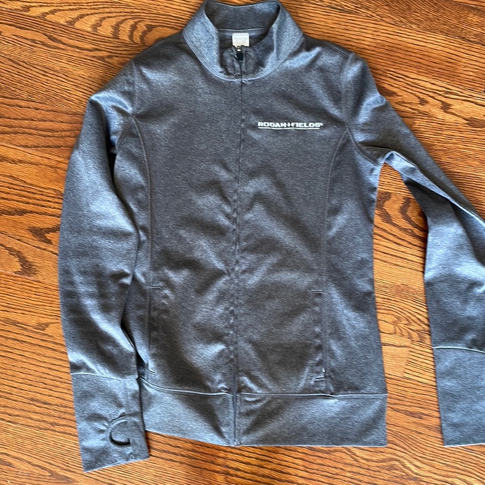 Never worn rodan fields workout jacket size S/M